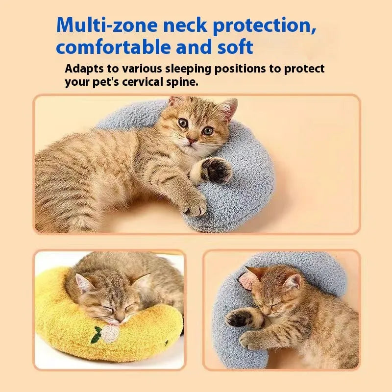 Blue Question Mark shaped cat sleeping mat with integrated U-shaped neck support pillow on a cage floor.