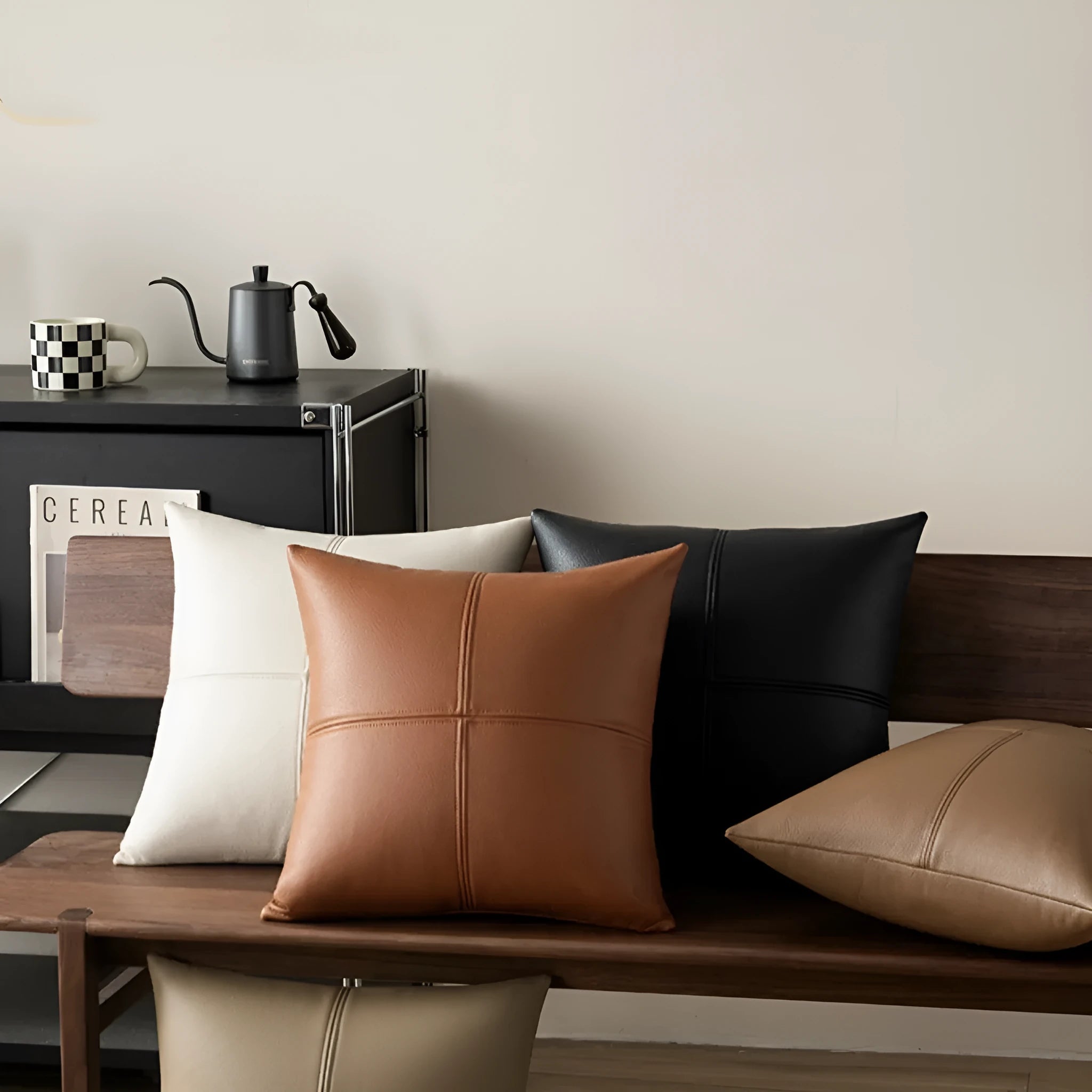 Soft cowhide leather solid colour pillow cover in a neutral shade on a sofa