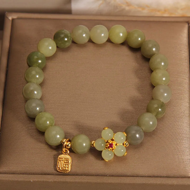 Women's alloy bracelet in grey jade colour with clasp closure for casual wear.