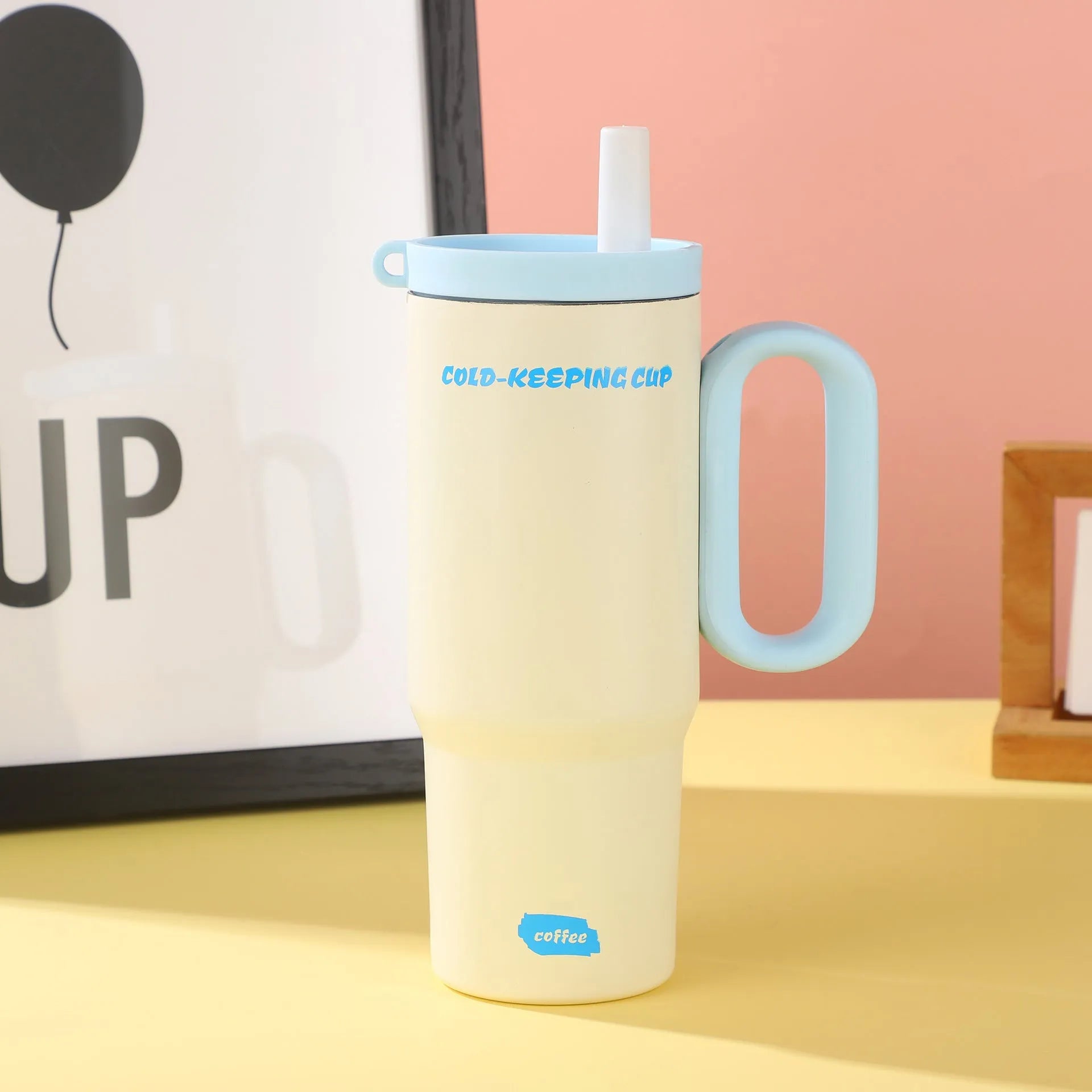 Portable large capacity insulated drink cup with handle in multiple colour options.