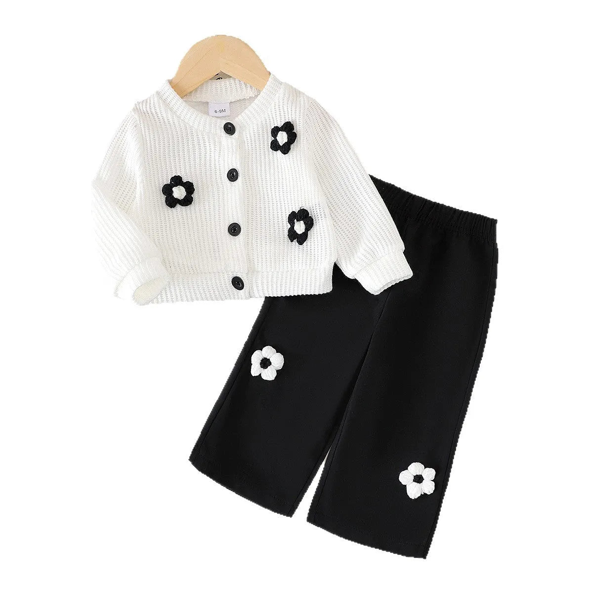 Baby girl cotton outfit set with white long-sleeved wool flower top and black trousers for toddlers 6 months to 3 years