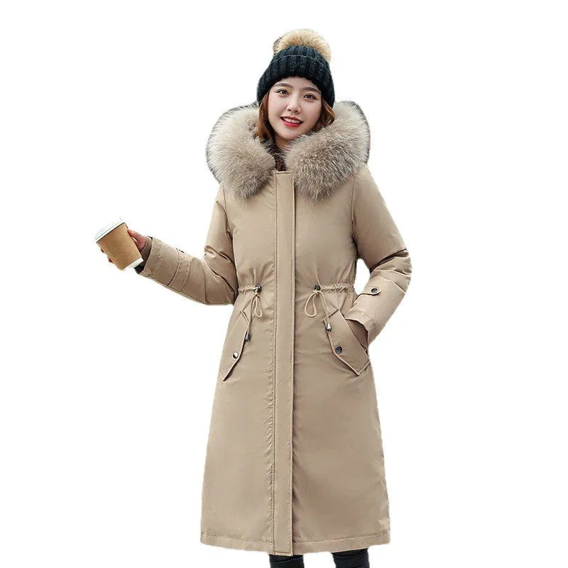 Women's long beige trench coat with a 100cm length, down cotton filler, and long sleeves shown in an elegant style.