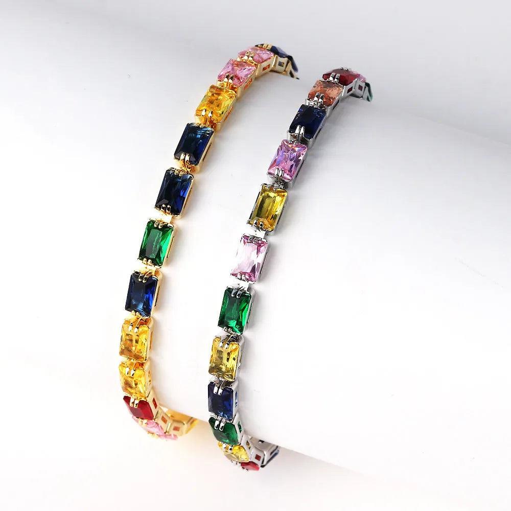 Women's zircon bracelet with electroplated alloy in golden or platinum finish with coloured zircon stones