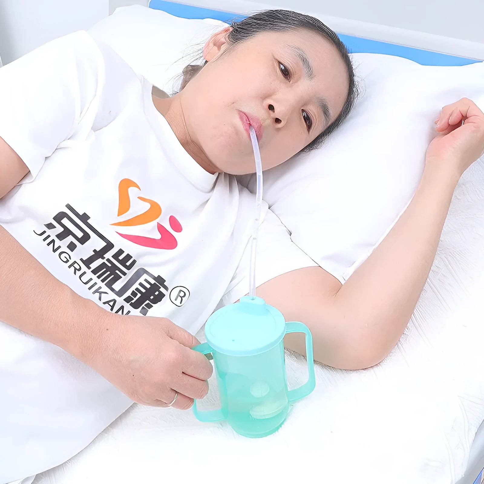 Adult bed care drinking cup with lid and handle, shown in various designs including oblique mouth choke proof cup.