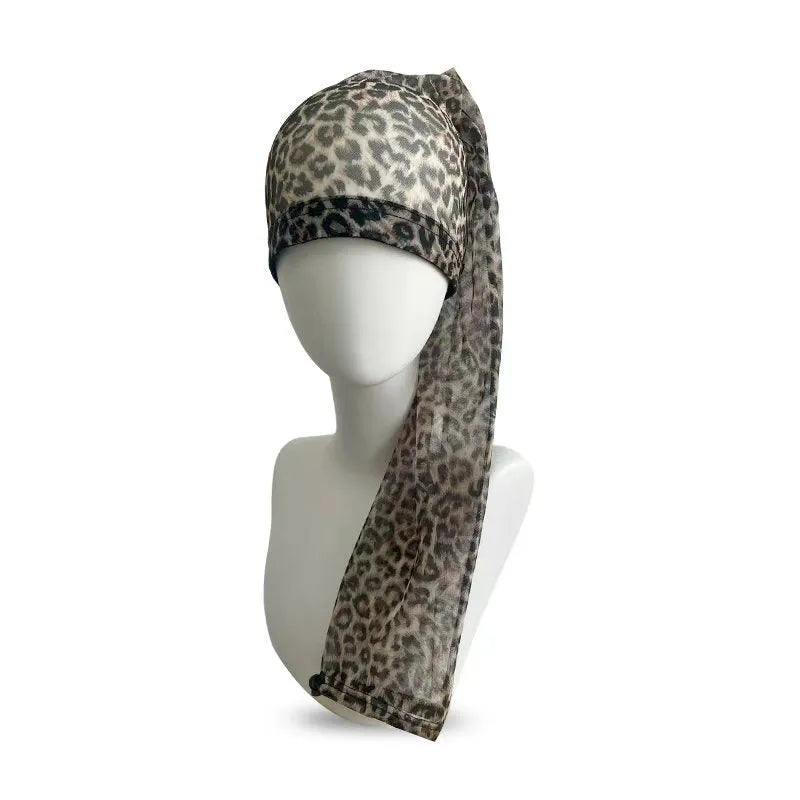 Breathable spandex mesh wig cap in multiple colours including black, pink, and leopard print