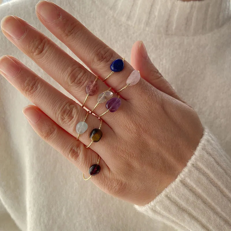 Original geometric design women's ring with a coloured agate stone centrepiece.