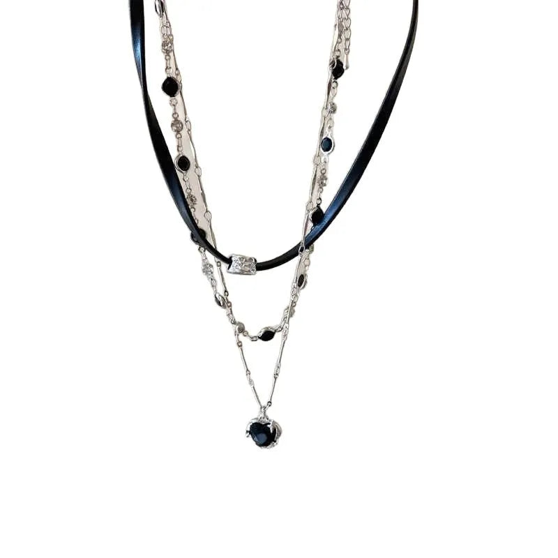 Women's adjustable leather heart pendant necklace with alloy chain and artificial crystal details on a model.