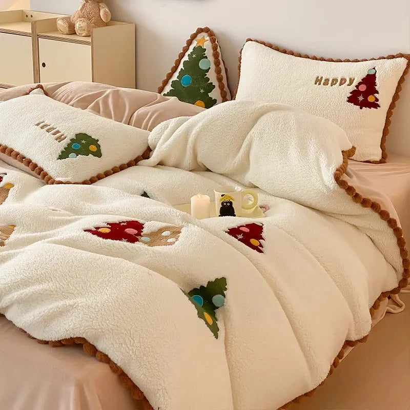 Bright yellow fleece-lined duvet cover with embroidered Christmas cartoon trees on a bed.