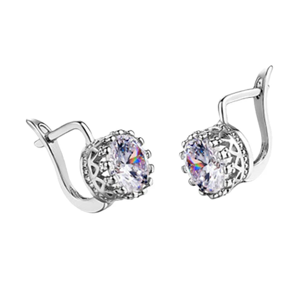 A pair of Korean retro crown-shaped clip-on earrings with a white diamond centre, in a rose gold finish.