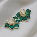 Green heart-shaped glass pendant ear clip earrings with alloy gemstone inlays on copper frame