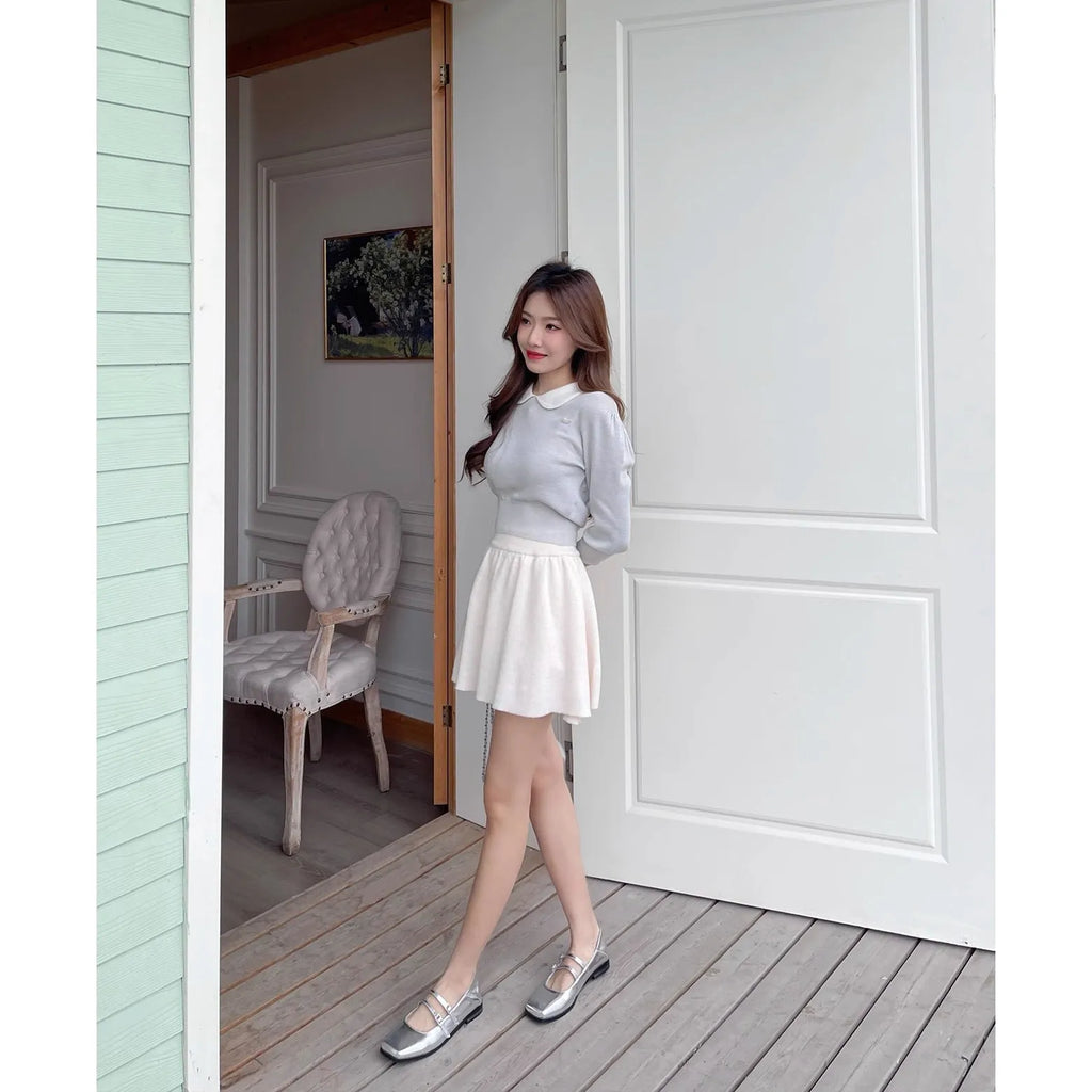 Women's silver genuine leather Mary Jane shoes with a cross buckle strap and flat sole.