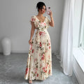 Apricot V-neck floral print dress with ruffled sleeves and a high-waisted swing skirt.