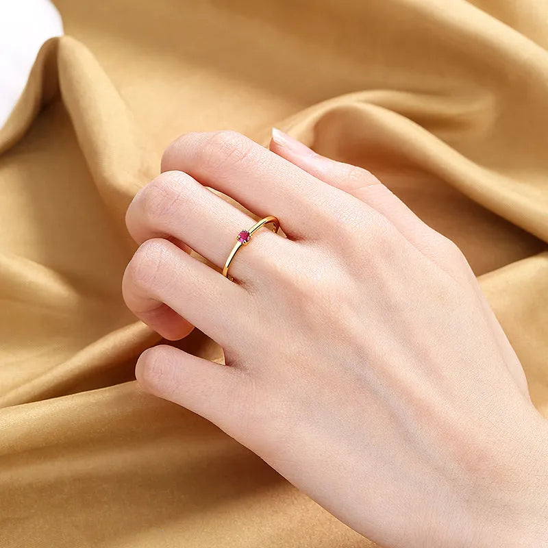 Women's twin style copper geometric fine circle ring with a single diamond, shown in available colours.