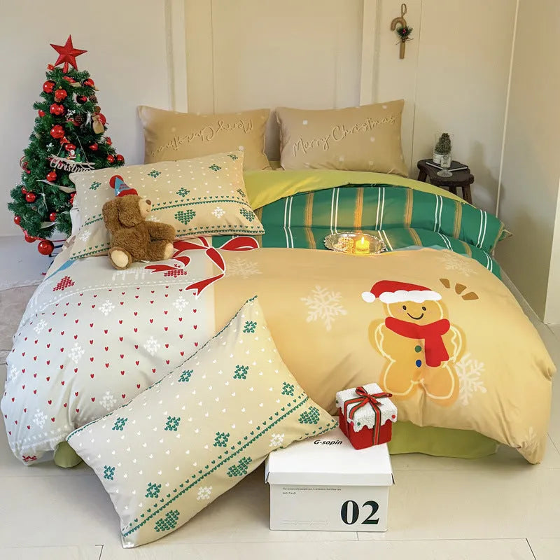 Cartoon Christmas duvet cover and pillowcase set in red and green on a bed.