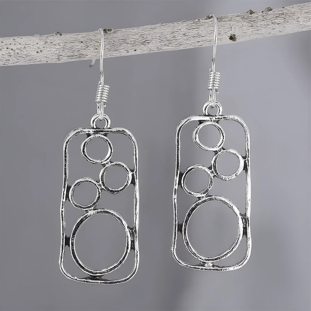 Geometric round earrings in antique silver finish made from zinc alloy for men and women
