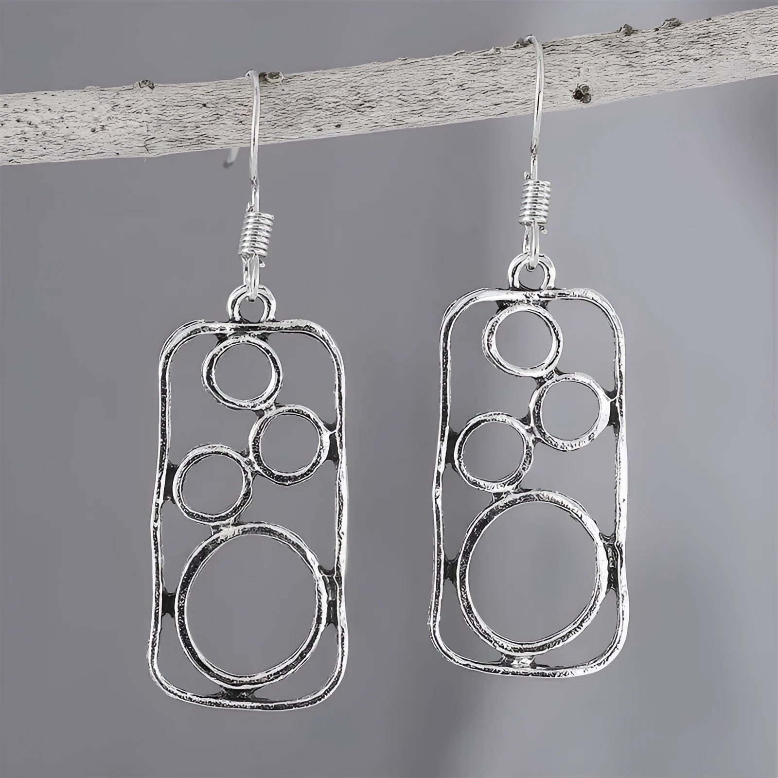 Geometric round earrings in antique silver finish made from zinc alloy for men and women