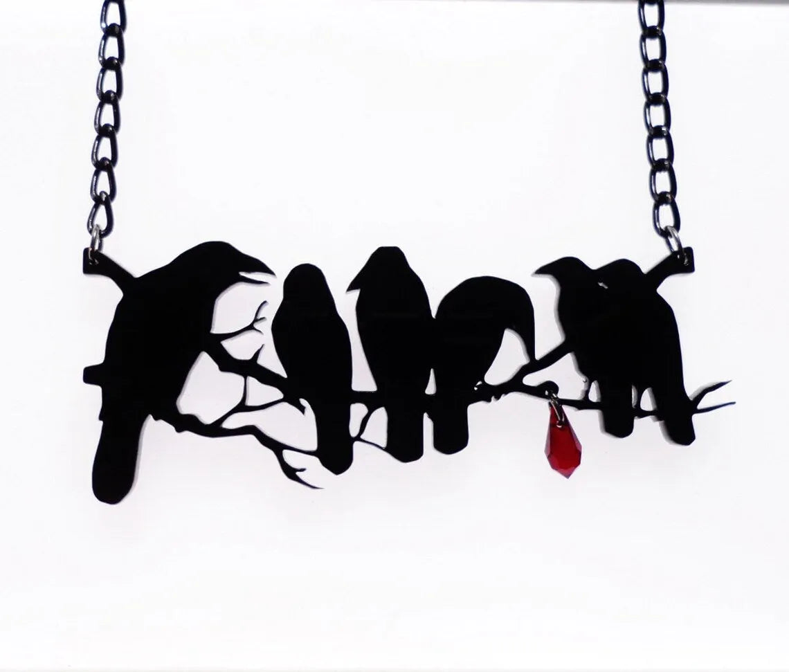 Black crow bird design necklace with electroplated finish on cross chain
