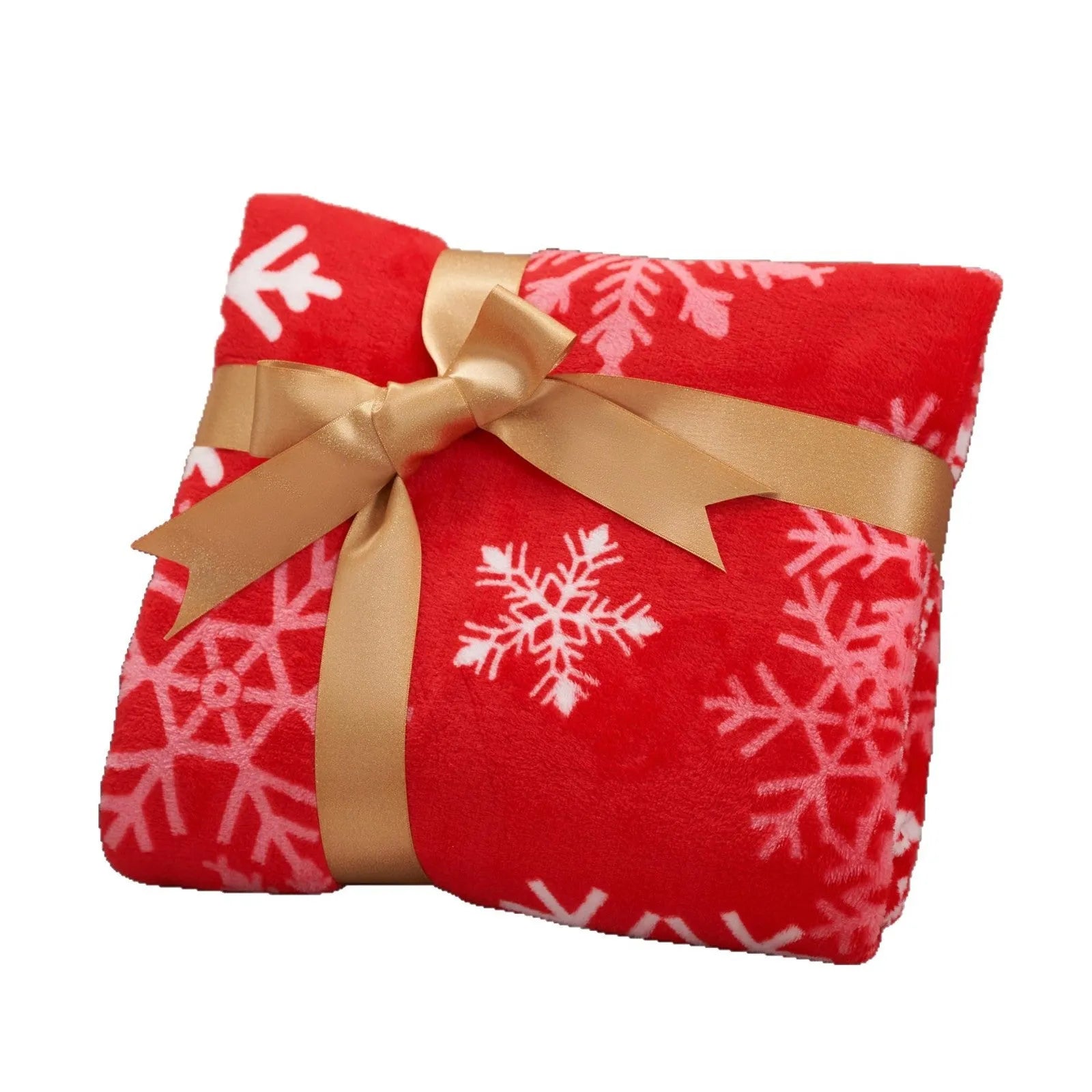 Soft red and green plush Christmas blanket draped over a sofa