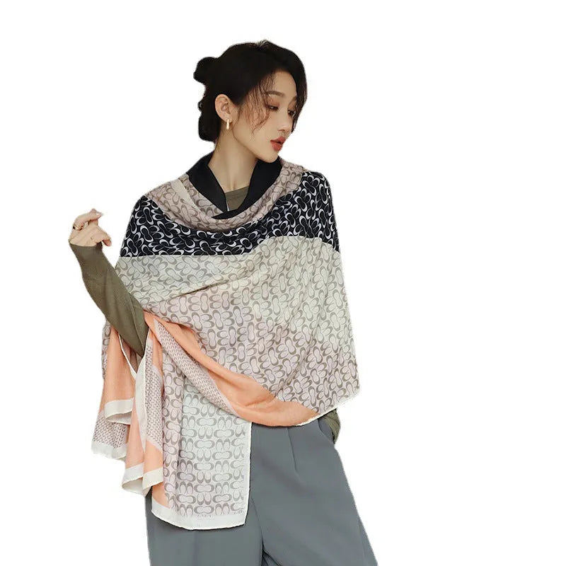 Polyester decorative scarf measuring 180cm by 90cm in one of three autumn print styles