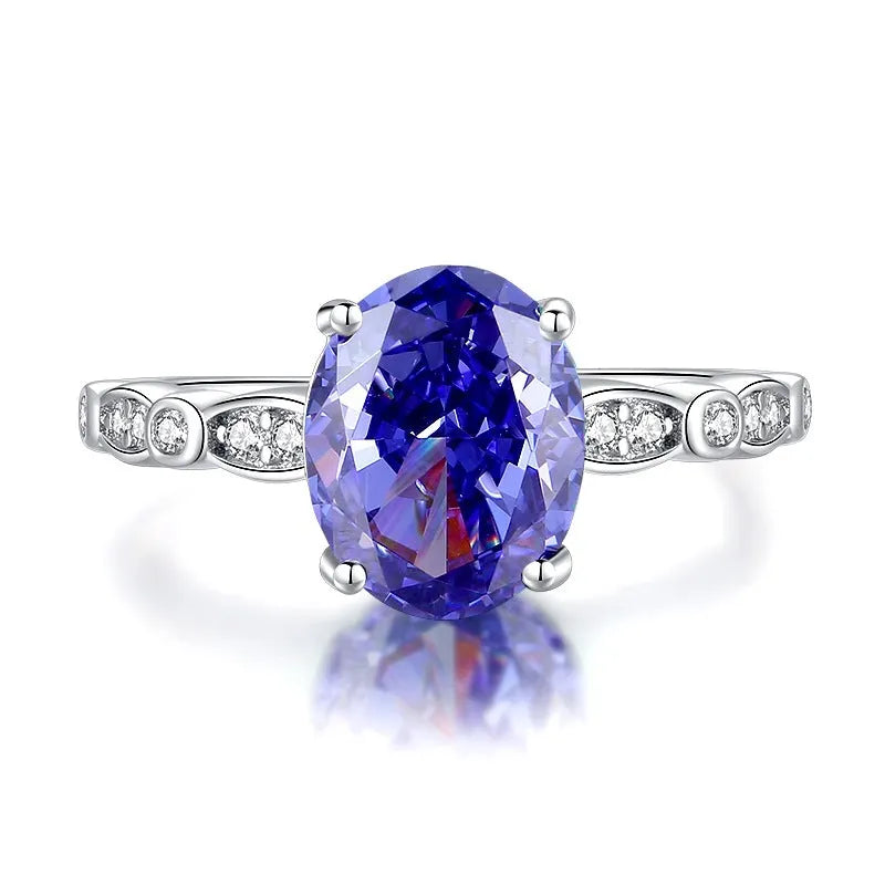 Heart-shaped sterling silver ring with a detailed ice flower cut colour zircon centre stone.