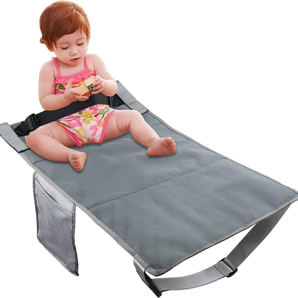 Portable blue children's aircraft pedal seat extender with extension device and drawstring pocket.