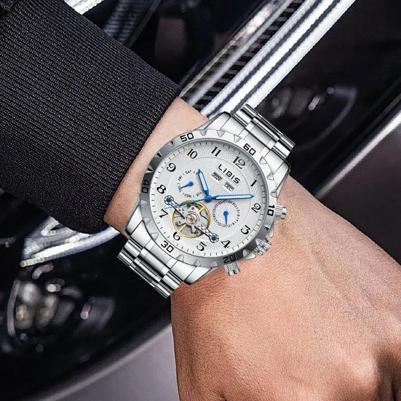 Silver men's automatic perpetual calendar mechanical watch with stainless steel strap and sapphire crystal glass.