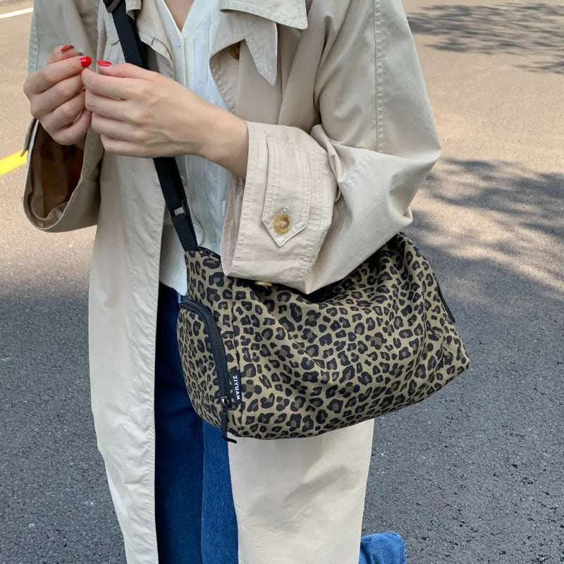 Leopard print cross-body shoulder messenger bag with sports styling and large capacity design