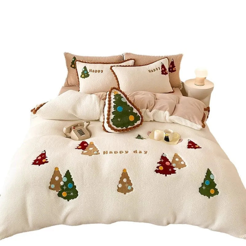 Bright yellow fleece-lined duvet cover with embroidered Christmas cartoon trees on a bed.