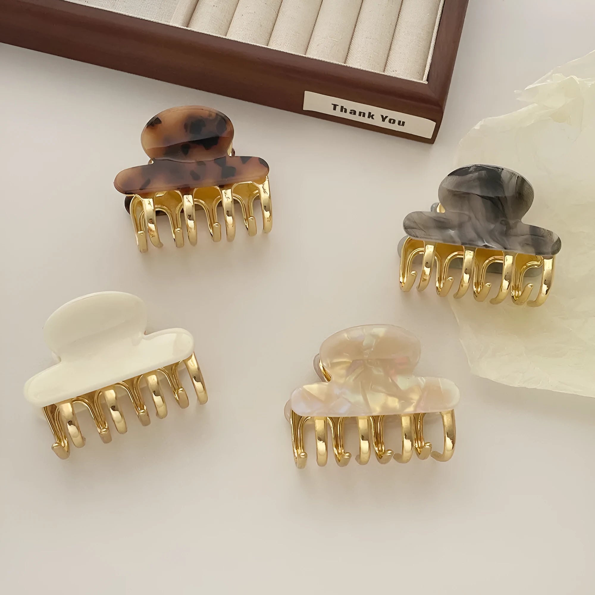 A medium-sized retro acetate hair barrette with a metal grip in a choice of four colours.
