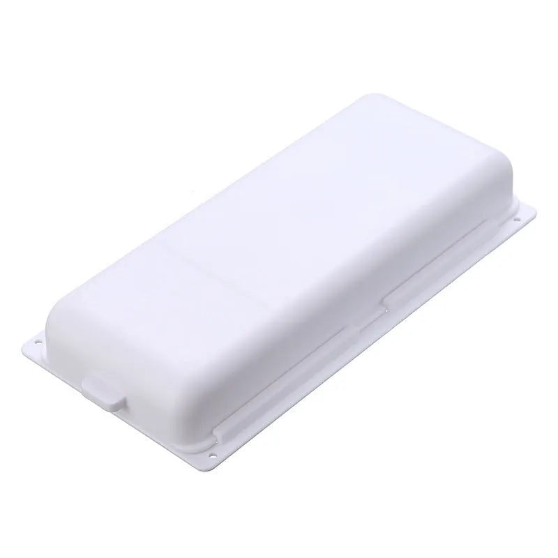 White plastic under-table storage drawer with magnetic adhesive backing and internal grid compartment