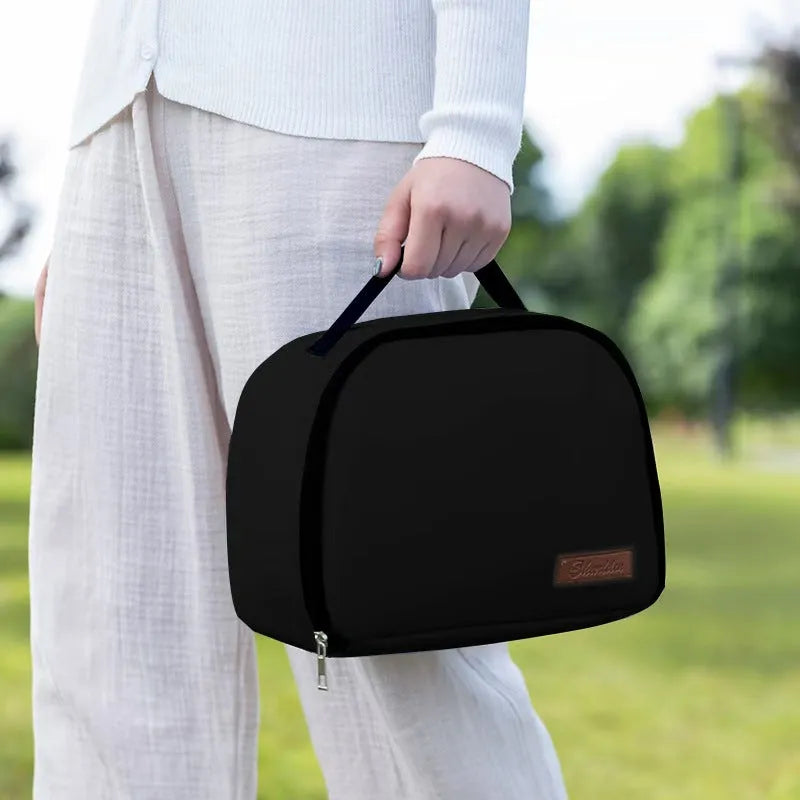 Insulated lunch bag in textured cloth material with bento handbag style and modern minimalist design