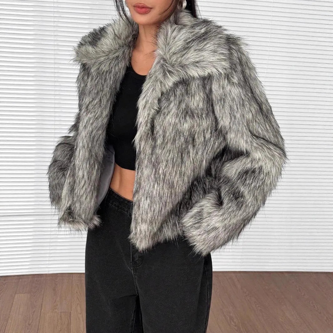 A woman's short-length artificial fur coat with a faux fur collar in a plush grey Maojian tea colour.