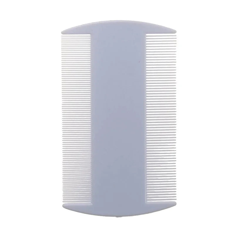 A white double-edged fine-toothed plastic lice comb on a blue surface, showing its 8cm length.
