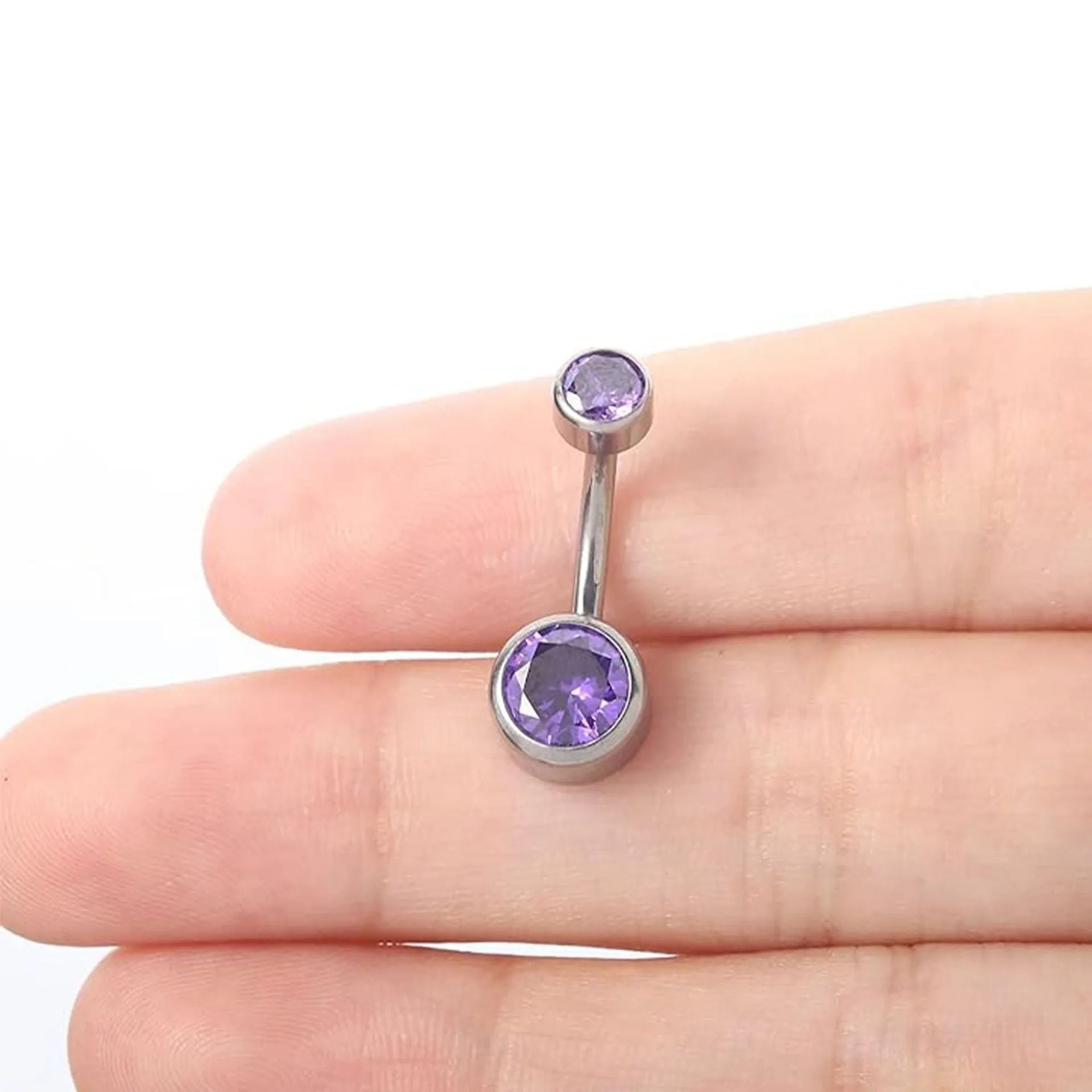 Titanium alloy double-headed navel stud with internal thread in various colours and sizes.