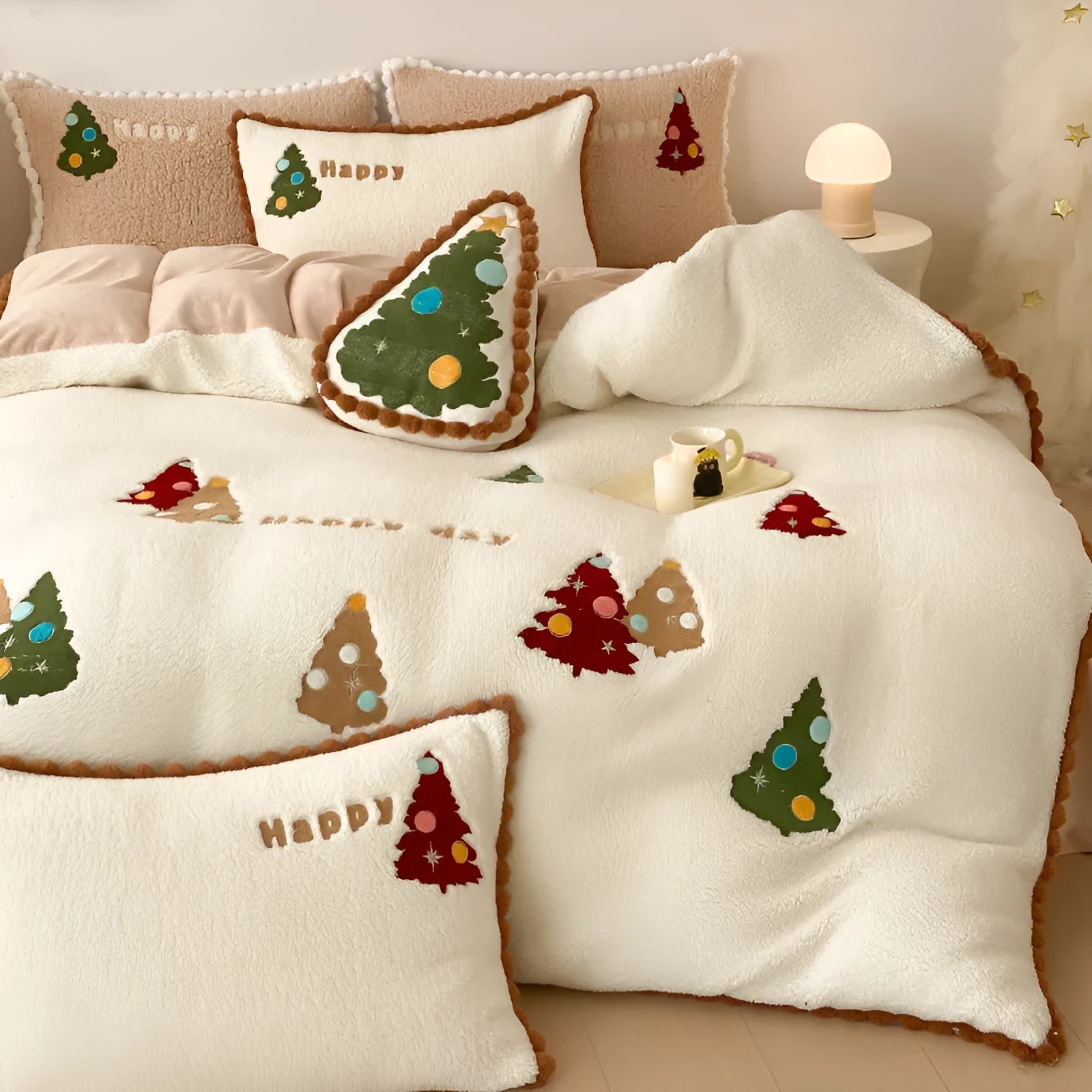Bright yellow fleece-lined duvet cover with embroidered Christmas cartoon trees on a bed.