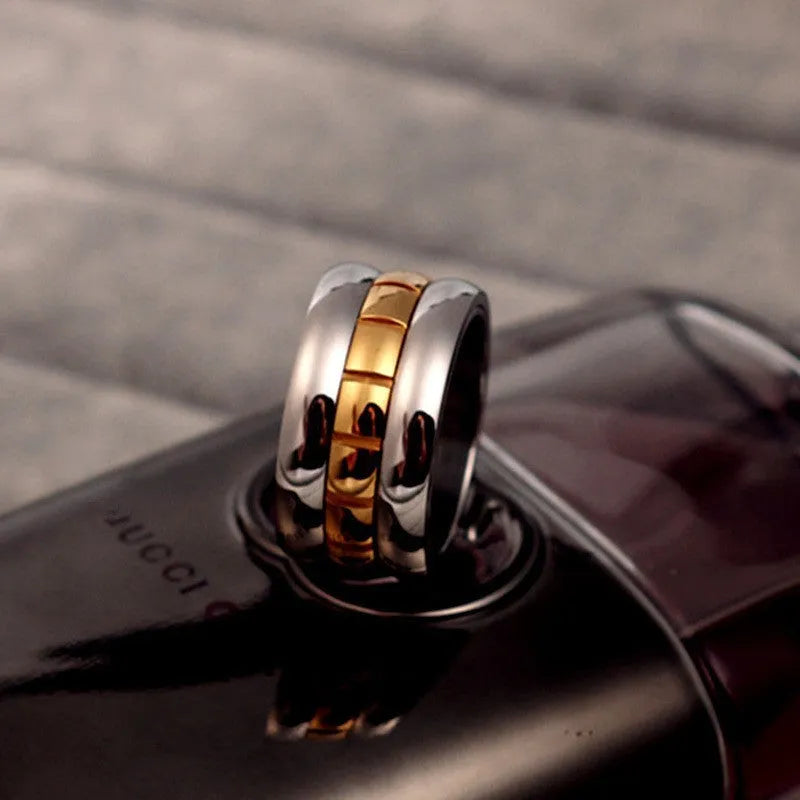 Ultra-wide gold titanium steel knuckle ring with rotatable band, sizes 7 to 10, natural style.