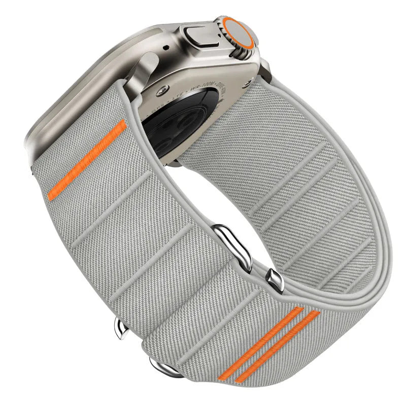 Elastic nylon Apple Watch replacement band with stainless steel buckle in various colours.