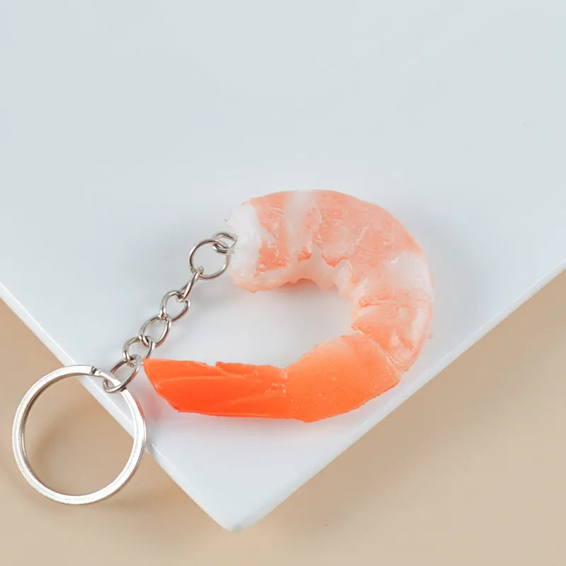 PVC shrimp keychain with detailed 3D shape and modern minimalist style