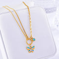 Gold tone titanium steel necklace and bracelet set with colourful epoxy butterfly pendants on a snake bone chain.