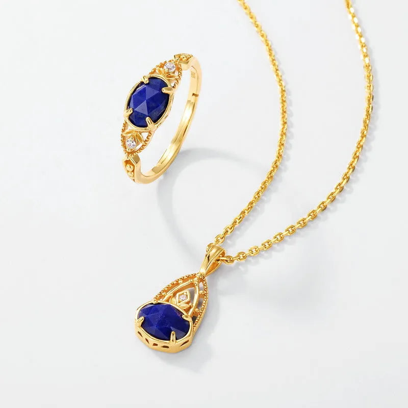 Japanese style silver alloy ring with blue lapis lazuli stone in an elliptical geometric shape.