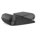 Grey embroidered triangle cushion on a sofa, showing its 68cm wedge shape for back support.