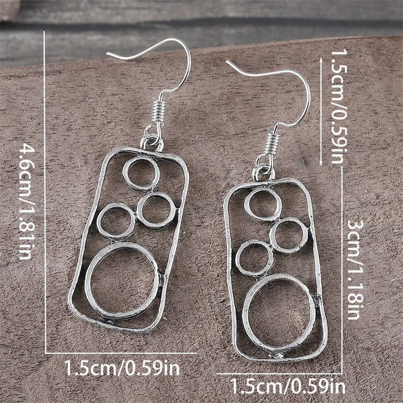 Geometric round earrings in antique silver finish made from zinc alloy for men and women