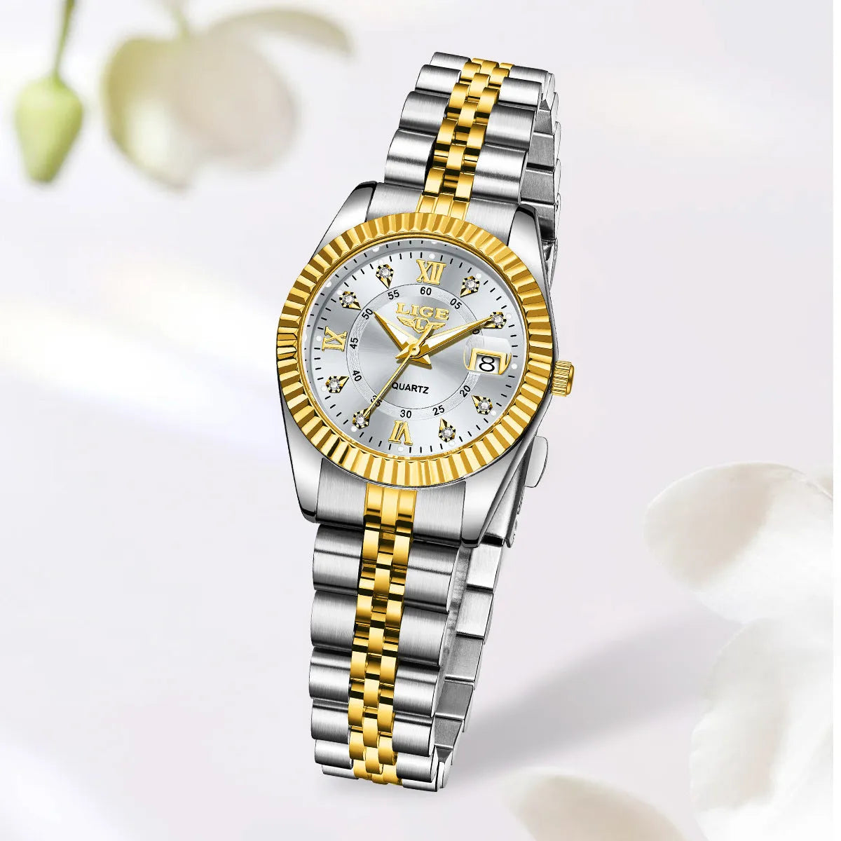 Gold and silver waterproof quartz watch for women with a 10mm thick case on a wrist.