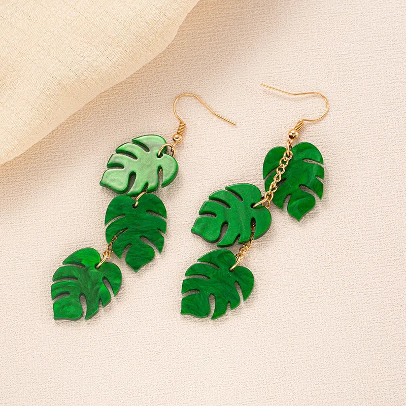 Acrylic drop earrings with a summer coconut artocarpus design on an alloy hook.