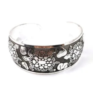 Ethnic carved open Miao silver bracelet with Roman shape in turtle colour option showing detailed openwork carving