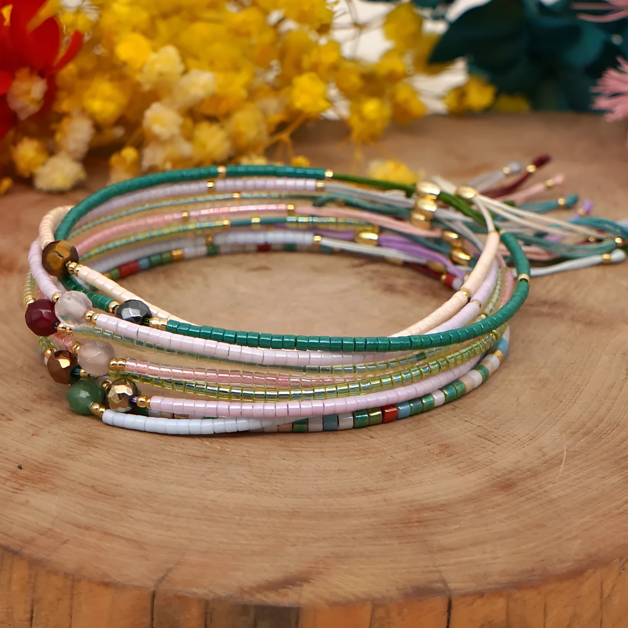 Handmade adjustable women's bracelet with colourful geometric glass and semi-precious stone beads in Bohemian style.