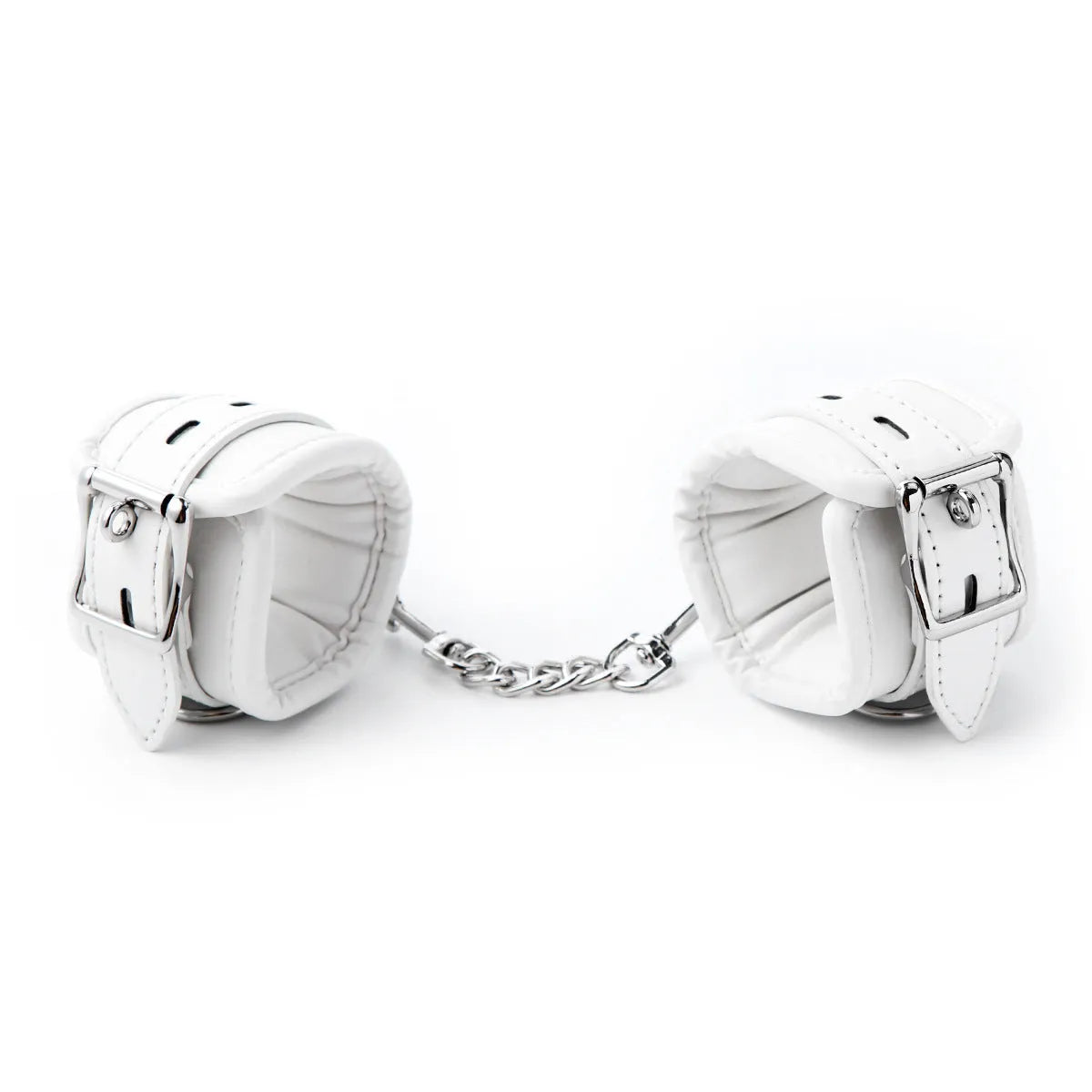 White PU sponge bondage set showing handcuffs, foot cuffs, and a neck scarf arranged together.