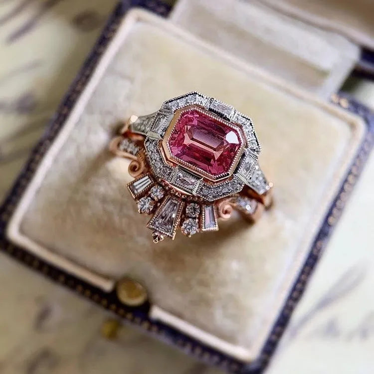 Rose gold alloy women's ring with a geometric shape and ruby-style decoration in a retro design.