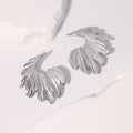 Gold and steel colour stainless steel leaf stud earrings with retro design