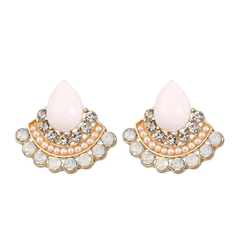 Women's retro fan-shaped silver earrings with opal and rhinestone details on an alloy setting.